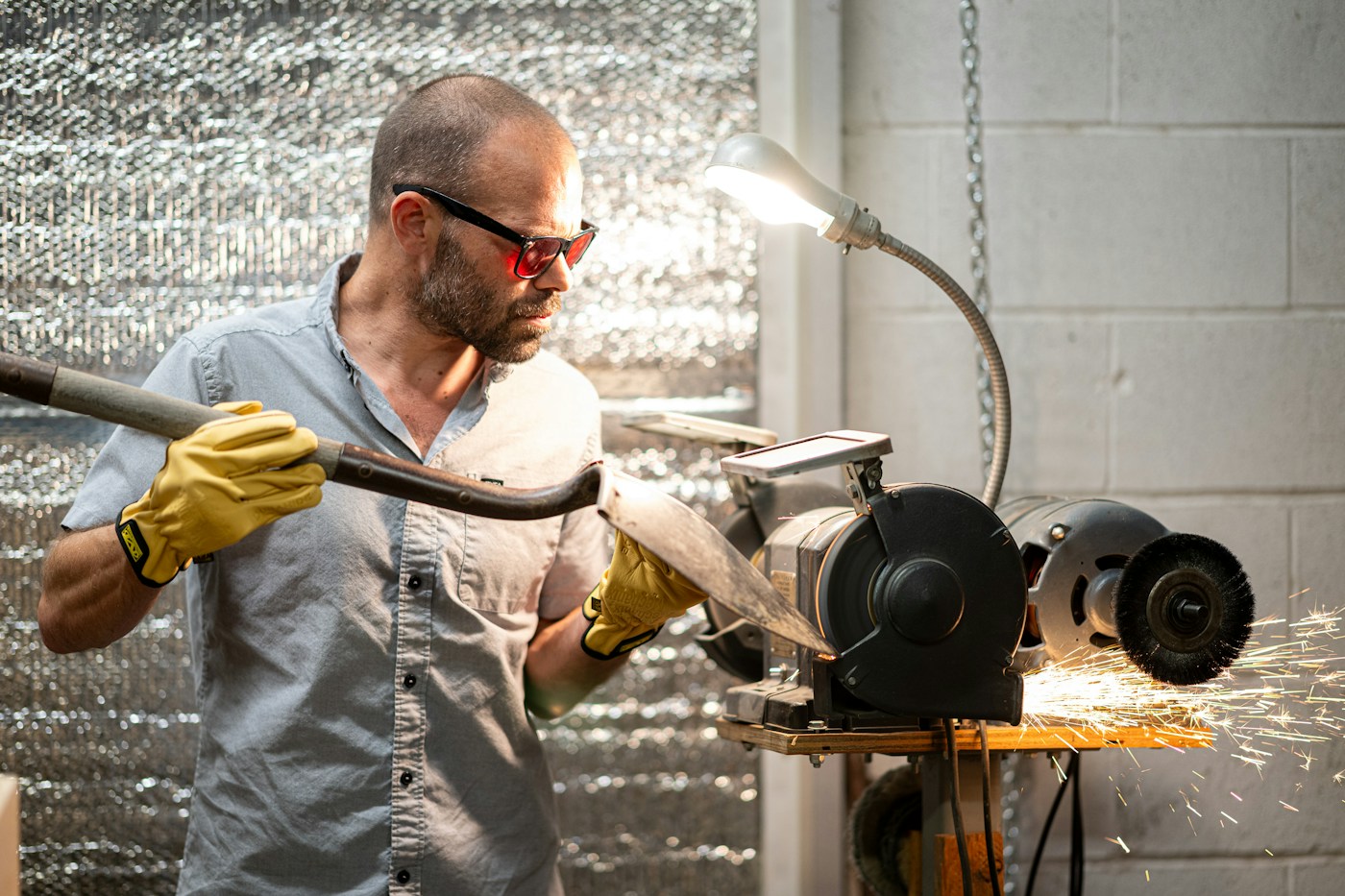 An employee working safely in a manufacturing workshop.